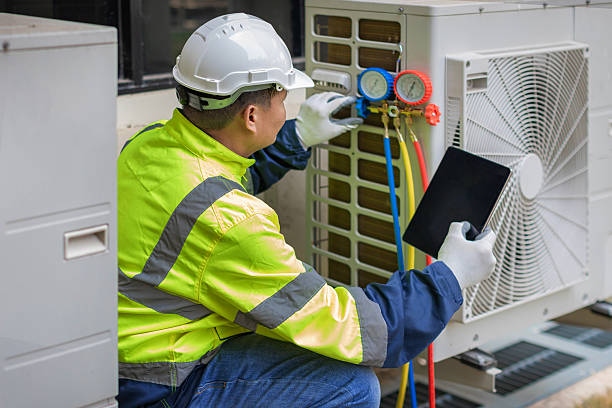 Professional Heat Pump Repair technician working in Colgate, WI